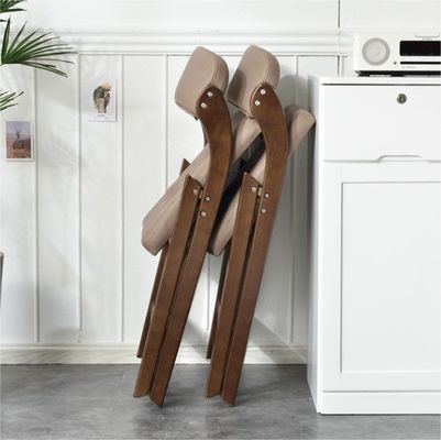 북유럽 현대 스타일의 레스토랑 호텔용 PU 가죽 포장 고형 나무 접기 의자