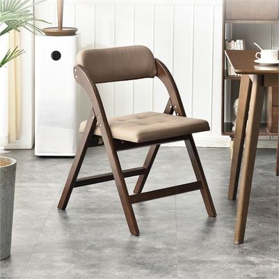 북유럽 현대 스타일의 레스토랑 호텔용 PU 가죽 포장 고형 나무 접기 의자